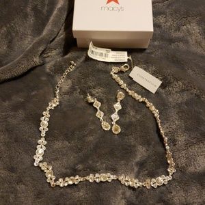 Custom jewelry.  Bought for a wedding worn 1x